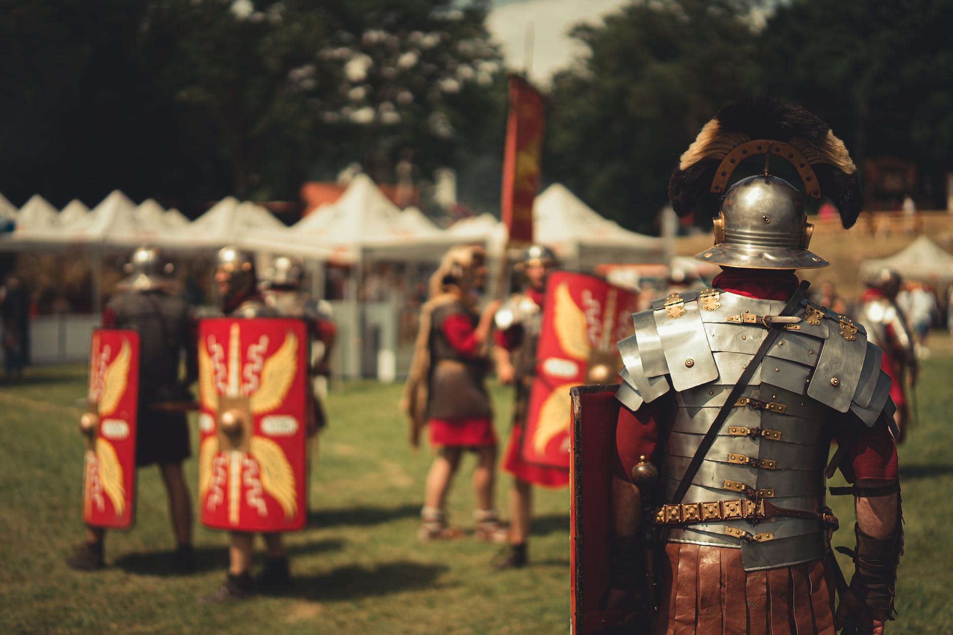 men dressed in armor at a festival